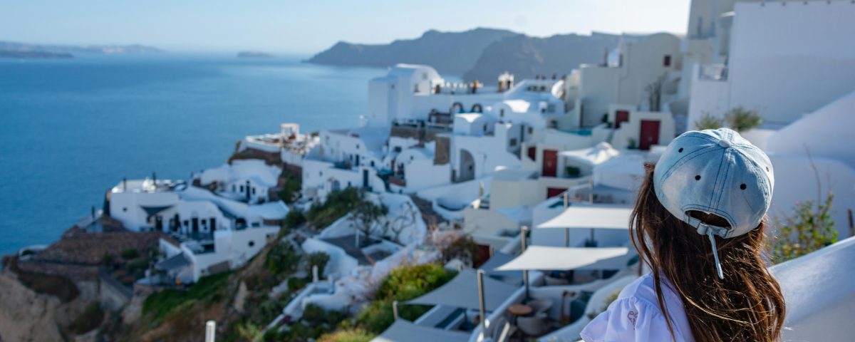 Local mom and daughter enjoying family activities in Santorini