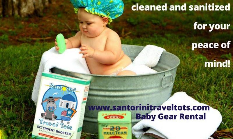 Baby enjoying bath time on vacation in Santorini